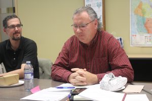 English Online Executive Director, Dan Sylvester, talking at a board meeting.